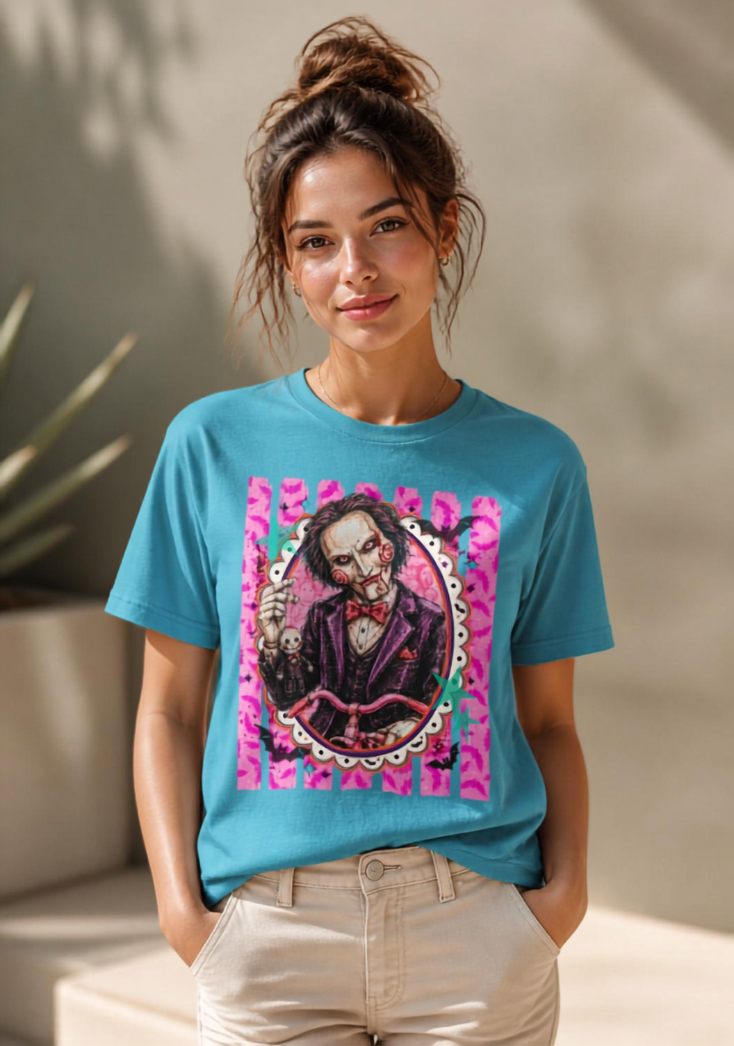 Saw Puppet Graphic Tee — Retro Pink Horror Movie T-Shirt